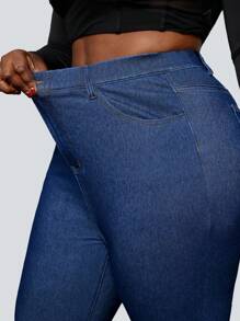 Flexra Pantalones informales de mezclilla elástica de punto talla grande con elástico