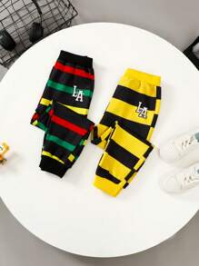 2 szt. Elastyczna talia dla chłopca z aplikacją w kolorowe paski, spodnie sportowe casualowe