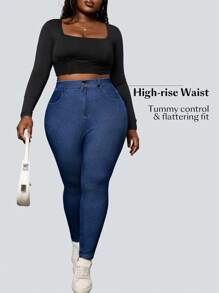 Flexra Pantalones informales de mezclilla elástica de punto talla grande con elástico