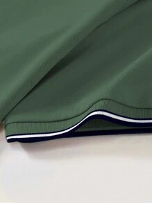Manfinity Dauomo Camisa polo de manga corta casual y versátil con estampado de rayas para hombre