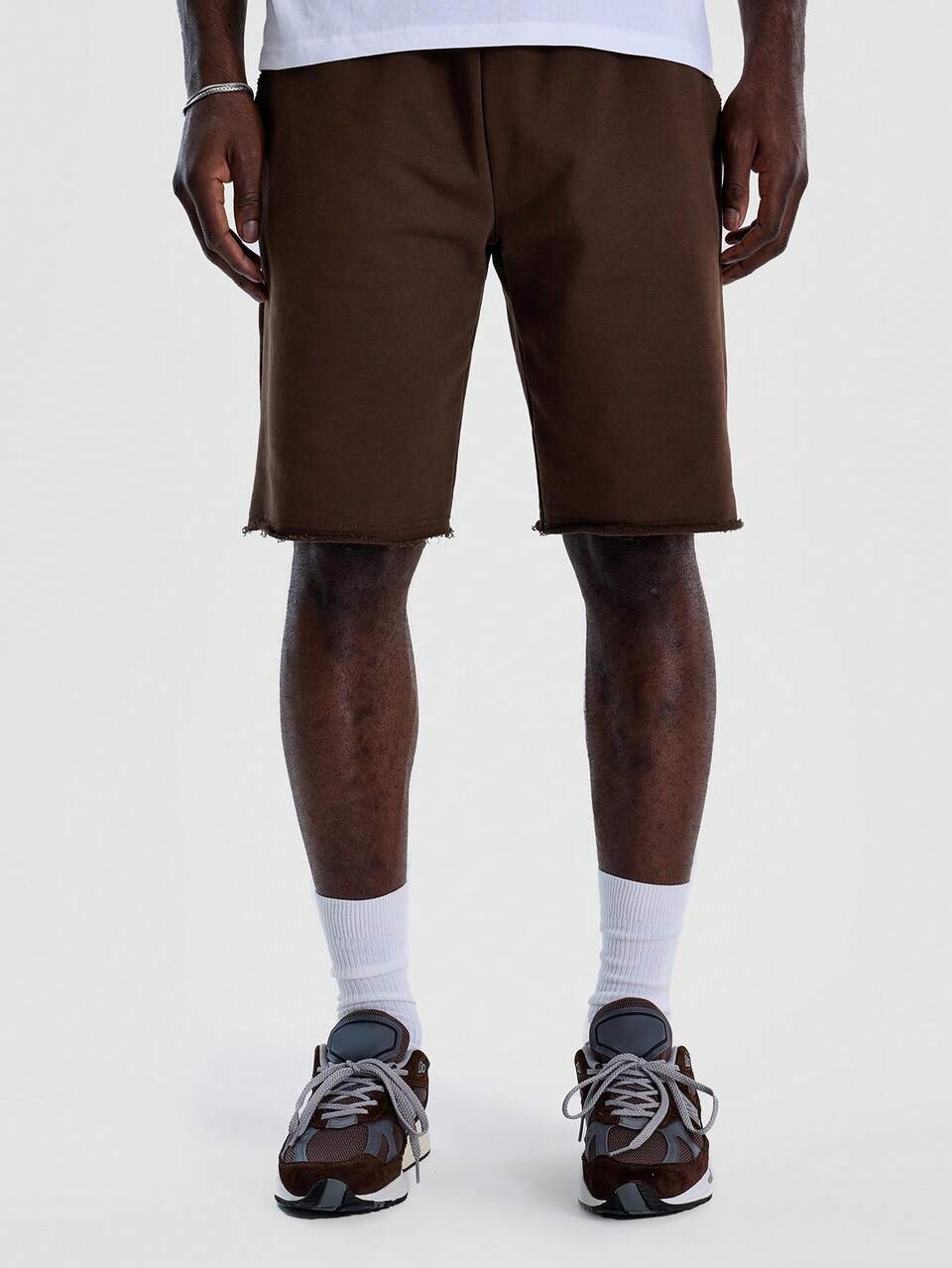 Pantaloncini in jersey con vita elasticizzata e orlo grezzo, ideali per il guardaroba primavera/estate