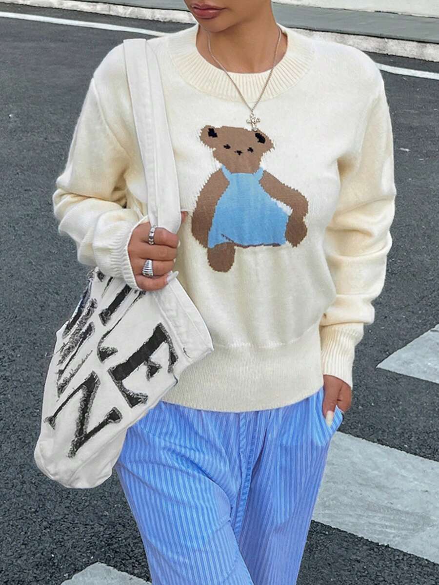 INAWLY Áo len dệt kim cổ tròn thả vai họa tiết gấu hoạt hình thường ngày cho nữ, mùa thu/đông - Màu be - Xem 1