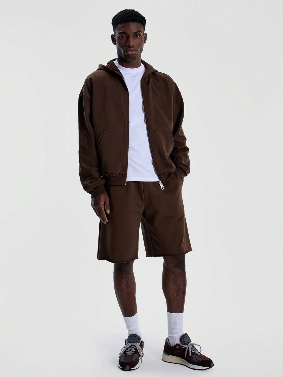 Pantaloncini in jersey con vita elasticizzata e orlo grezzo, ideali per il guardaroba primavera/estate