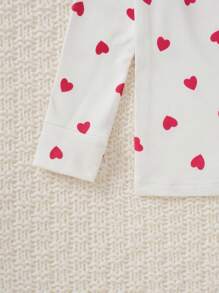 2 Stücke Set aus afrikanisch bedruckter Herz-Grafik Leggings und eng anliegendem Langarm-Homewear im Street-Fashion-Stil für Kleine Mädchen in Schwarz-Weiß