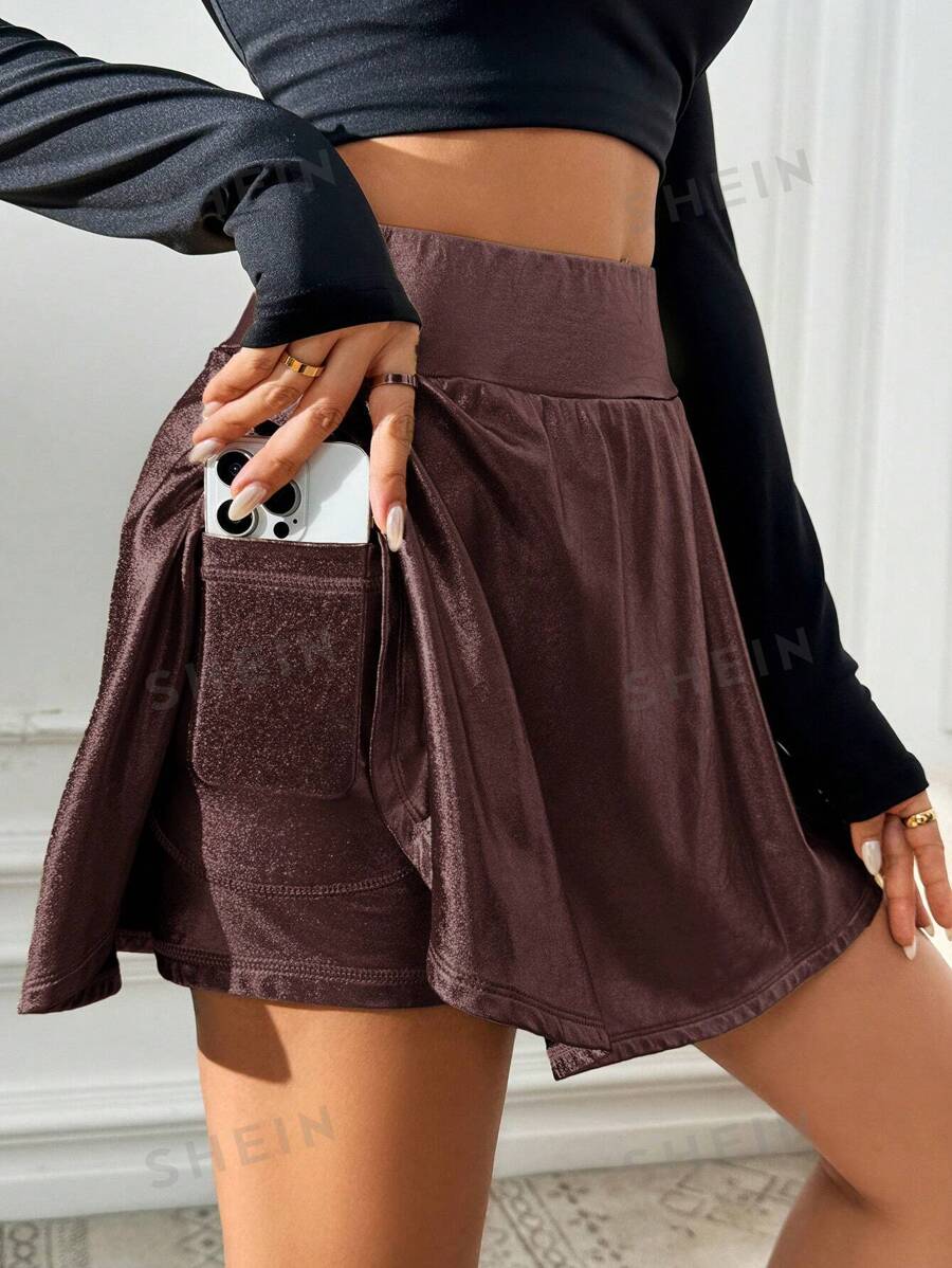 SHEIN Essnce Falda casual de cintura alta con bolsillos laterales, unicolor, deportiva y casual para mujer en otoño/invierno