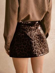 Poéselle Falda mini de mujer de estampado de leopardo de PU marrón, falda de estampado de leopardo de moda, apropiada para otoño e invierno