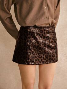 Poéselle Falda mini de mujer de estampado de leopardo de PU marrón, falda de estampado de leopardo de moda, apropiada para otoño e invierno