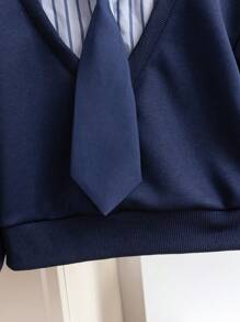 SHEIN Genkimix Kids Young Girl 2 In 1 Outfit With Shirt Collar Sweatshirt And Layered Skirt. The Blouse Features A Shirt Collar Design, Simple And Generous, Paired With A Necktie Decoration For A Playful And Elegant Look. The Skirt Adopts An A-Line Layered Design, Light And Flowy, With The Hem Swaying In The Wind As You Walk, Showcasing The Liveliness And Vibrancy