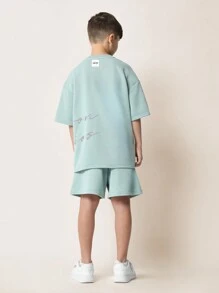 SUMWON Conjunto de verano para niños con camiseta oversize y shorts a juego con detalles de estampado de texto, ultra cómodo para usar de forma casual y en el tiempo libre - Verde - Ver 2
