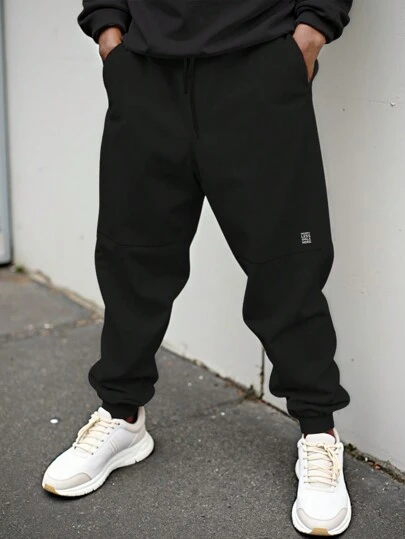 Manfinity Homme Men Plus Size Loose Fit Letter Graphic Drawstring Waist Sweatpants