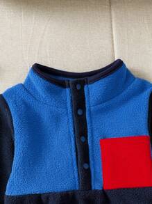 SHEIN Ensemble deux pièces à la mode et cool pour bébé garçon en hiver, comprenant un sweat-shirt tricoté multicolore avec fermeture à glissière et un pantalon de jogging noir.