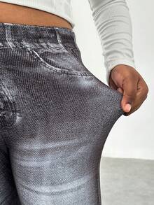SHEIN Leggings estampados con efecto de denim elástico para niñas preadolescentes