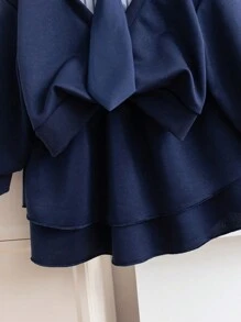 SHEIN Genkimix Kids Young Girl 2 In 1 Outfit With Shirt Collar Sweatshirt And Layered Skirt. The Blouse Features A Shirt Collar Design, Simple And Generous, Paired With A Necktie Decoration For A Playful And Elegant Look. The Skirt Adopts An A-Line Layered Design, Light And Flowy, With The Hem Swaying In The Wind As You Walk, Showcasing The Liveliness And Vibrancy