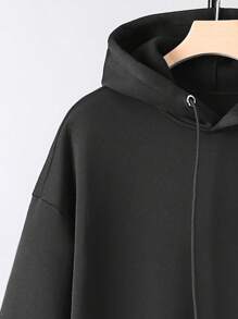 Manfinity Homme Áo hoodie nam trơn màu có túi, lót nhiệt, dài tay - màu đen - Xem 4