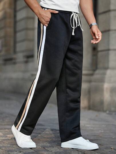 Manfinity RelaxMax Pantalones de chándal casuales para hombre con parche de unicolor, cordones y bolsillos