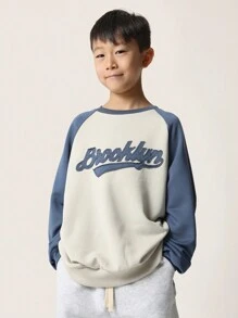SUMWON Sudadera casual con estilo de béisbol de Brooklyn, diseño de letras retro con aplicación, manga raglán, ropa deportiva de otoño e invierno para adolescentes