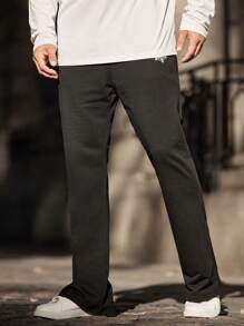 Manfinity EZcore Pantalones de chándal casuales con cordón y bolsillos para hombre, con estampado de copos de nieve