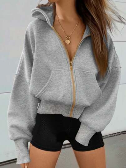 Felpa con cappuccio con zip e doppi tasconi laterali