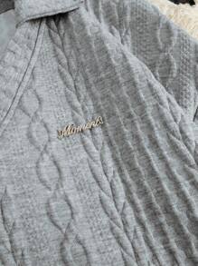 SHEIN Unity 女士休闲基本款纹理面料 V 领运动衫，带金属标志，适合秋冬季