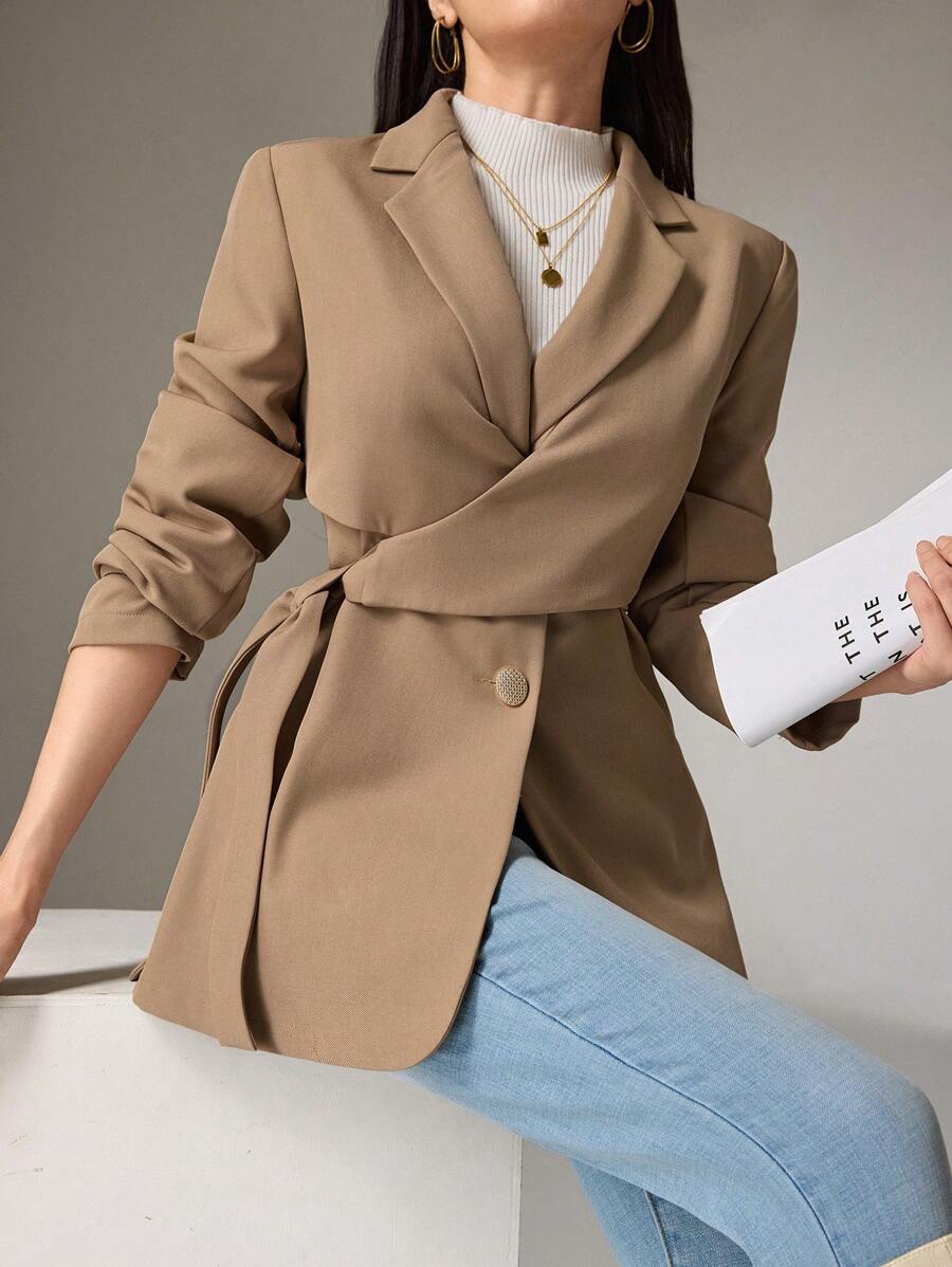 Heiryn Áo khoác blazer nữ tay dài ve áo màu trơn thắt nút bên hông, trở lại trường vào mùa thu/đông - Màu Khaki - Xem 1
