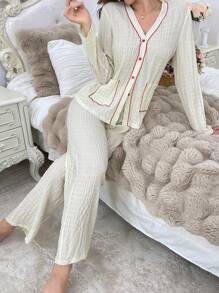 Conjunto de pijama de mujer con pantalón y cárdigan con textura y bolsillos con ribete en contraste
