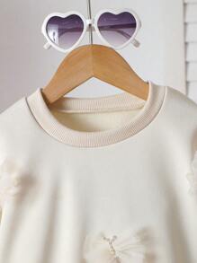 SHEIN 年轻女孩象牙色运动衫，带黑色网眼 3D 蝴蝶装饰，休闲时尚潮流，适合春秋冬季