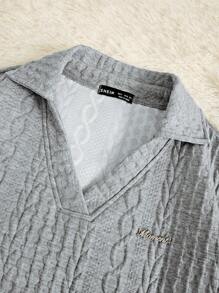 SHEIN Unity 女士休闲基本款纹理面料 V 领运动衫，带金属标志，适合秋冬季