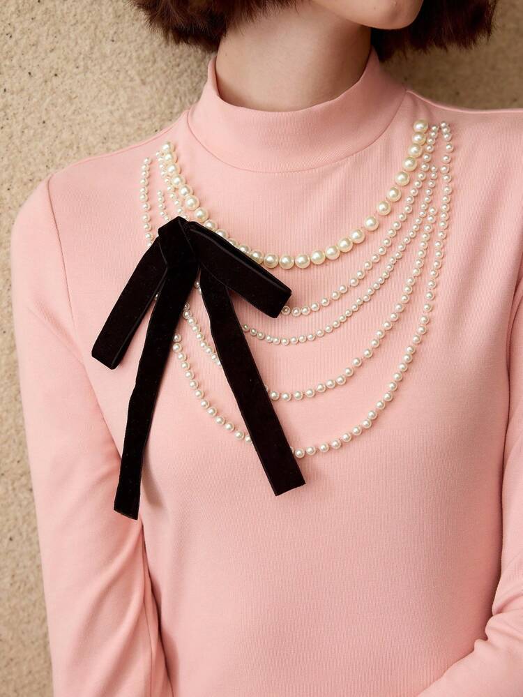 MOCK NECK FAUX PEARL CONTRAST BOW DETAIL SLIM FIT TEE