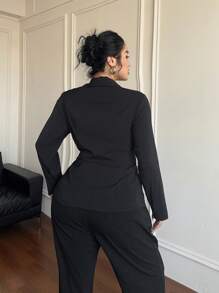 Flirla Blusa de manga larga elástica y ajustada de estilo universitario simple en negro para mujeres de talla grande