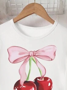 Set da 2 pezzi di abbigliamento casual per ragazze adolescenti, comprendente top bianco con stampa di ciliegie e pantaloni neri con stampa di ciliegie su tutto il capo, set comodo per il tempo libero