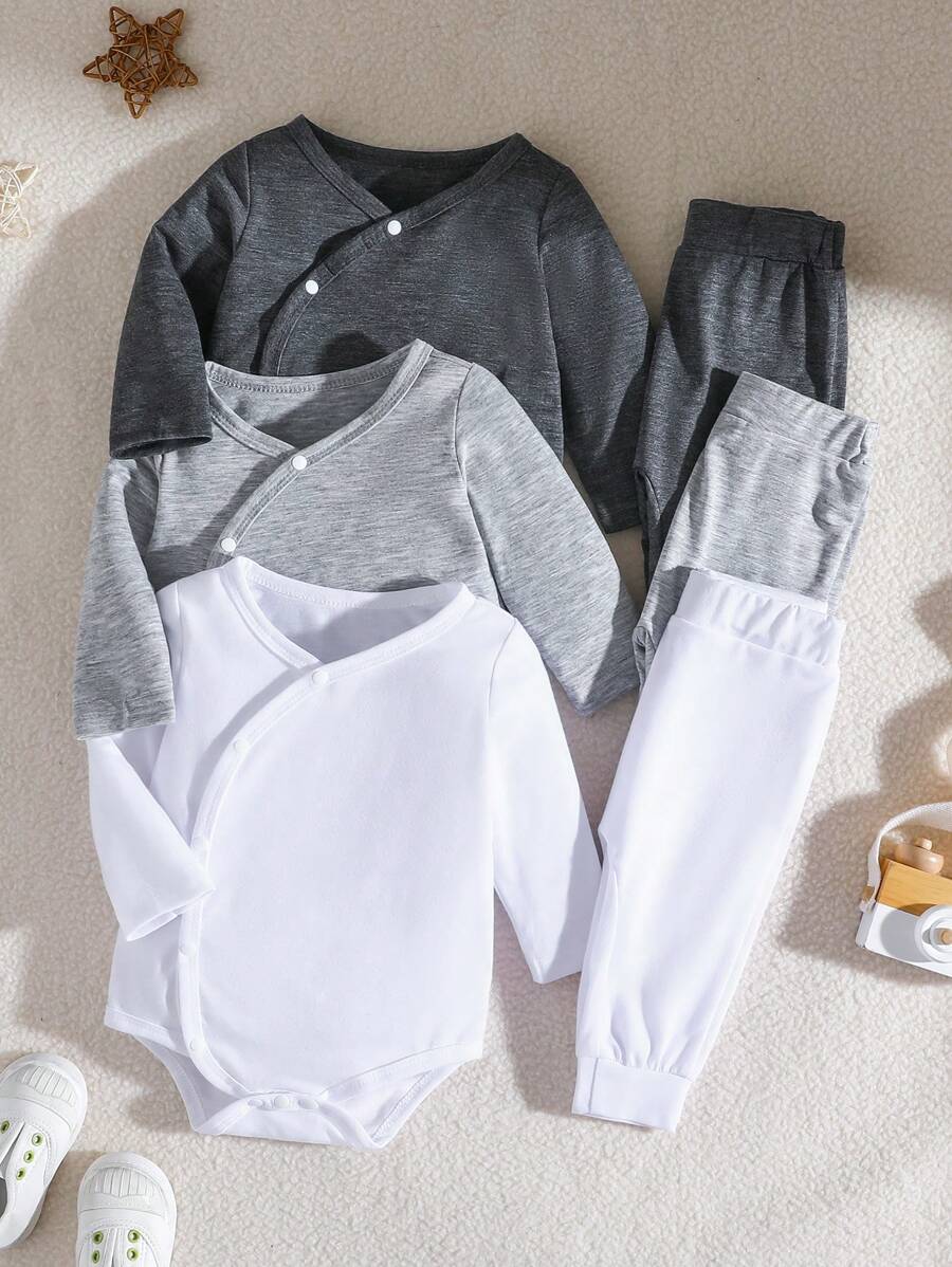 SHEIN Vintaside Kids Bộ áo liền thân 3 món này có thiết kế tinh tế và chất liệu cao cấp, được sản xuất đặc biệt để mang lại sự thoải mái và tiện lợi toàn diện cho trẻ sơ sinh và trẻ nhỏ. Bộ sản phẩm bao gồm ba áo liền thân, mỗi áo có thiết kế và chi tiết khác nhau để phù hợp với nhu cầu mặc của bé trong các dịp khác nhau. - Nhiều màu - Xem 1