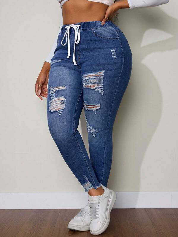 SHEIN SXY Pantalones vaqueros informales rotos con amarre delantero para tallas grandes