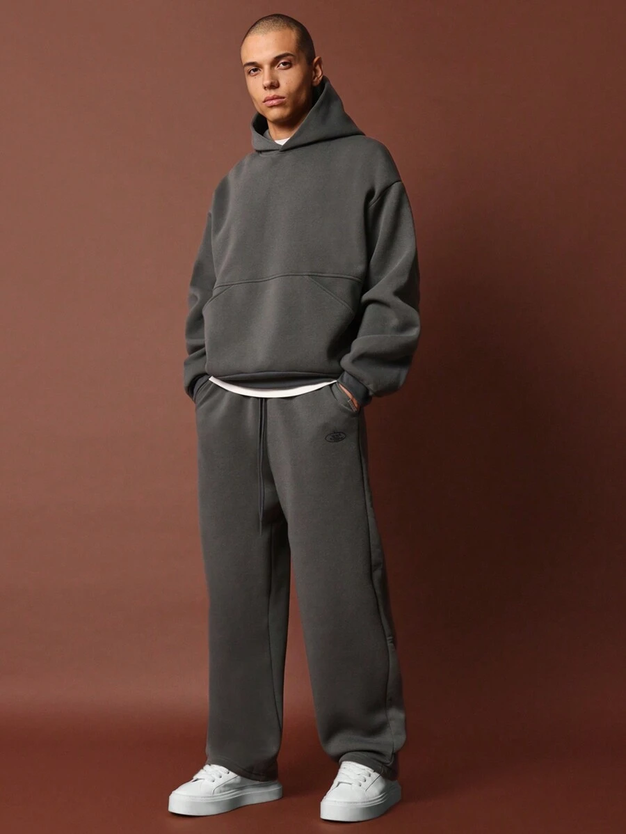 SUMWON Bộ đồ thể thao hoodie oversize và quần nỉ ống rộng - Màu xám đen - Xem 1