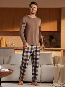 Conjunto de 2 piezas de camisa de manga larga de cuello redondo de unicolor y pantalones de pijama con estampado a cuadros para hombre, ropa de otoño