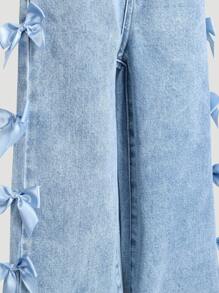 年轻女孩新款 3D 蝴蝶结装饰直筒牛仔裤