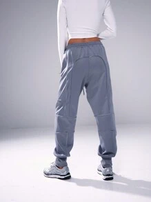Musera Sport Pantaloni della tuta con cuciture riflettenti e polsini, adatti per padel, tennis, pickleball, palestra e fitness - Grigio - Visualizzare 4