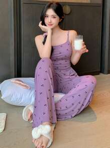 DAZY Conjunto de pijama con camiseta ajustada de estampado total asimétrico y pantalones rectos sueltos