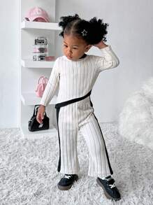 SHEIN Explorewe 2-częściowy zestaw Baby Girl Casual All-Match Fashion Solid Soft Knitted Round Neck Top z asymetrycznym dołem i rozkloszowanymi spodniami, ciepły dzianinowy materiał na jesienne/zimowe wyjścia i wypoczynek w domu
