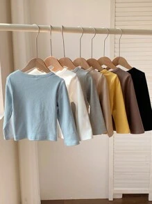 SHEIN Conjunto de 7 camisetas de manga larga de punto de unicolor, ideales y versátiles para niños y niñas pequeños en otoño/invierno