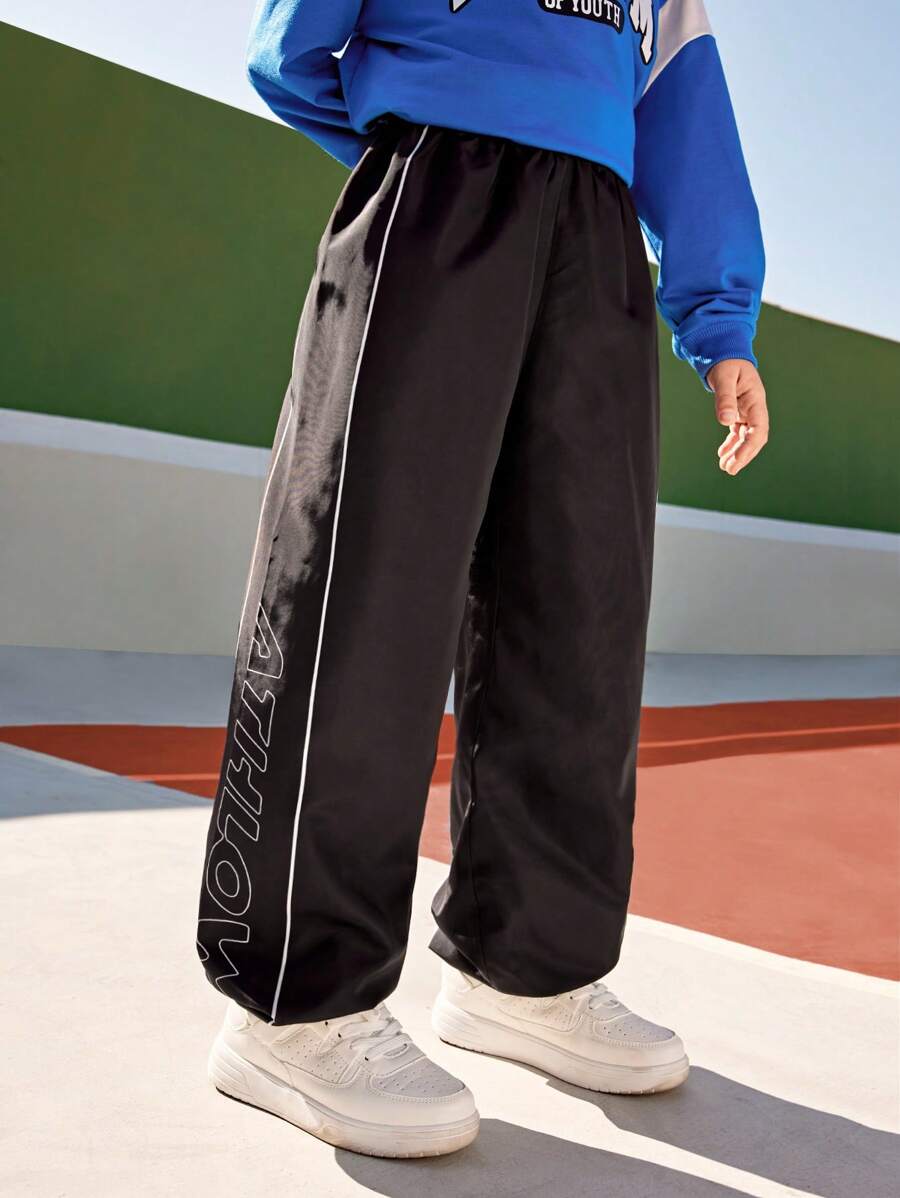SHEIN Tween Boys Thermal Lined Loose Comfortable Drawstring Tapered Casual Trousers, Fashionable And Minimalist Leisure Cargo Pants For Cycling And Outdoor Activities - Black - View 1