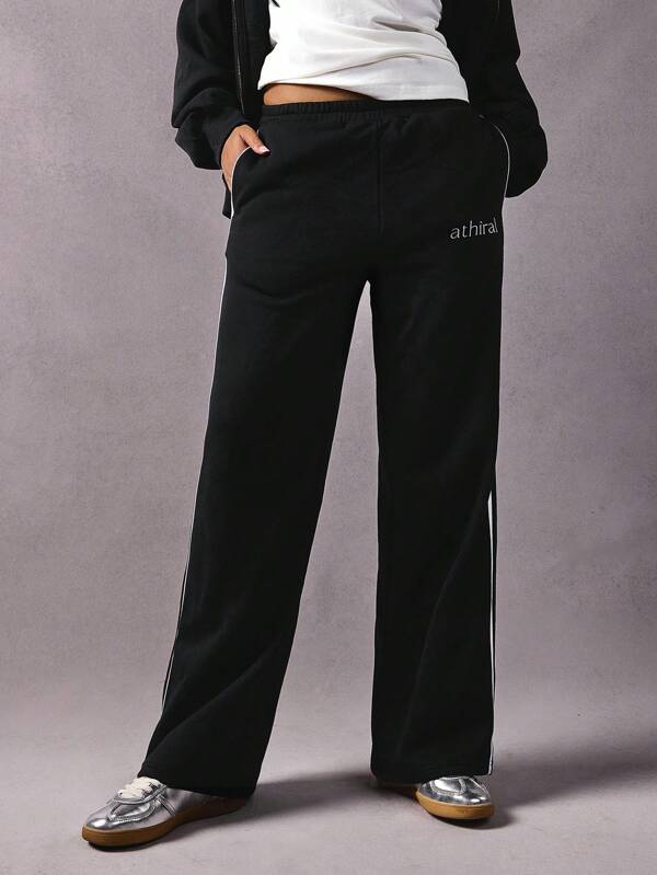 Athîral Pantalones rectos con logotipo bordado mujeres joggers