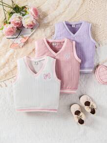 SHEIN 3 件装女婴针织提花心形和蝴蝶结装饰背心套装，休闲英式风格中等重量，适合搭配连衣裙或衬衫作为外套，春秋季 - 彩色 - 查看 1