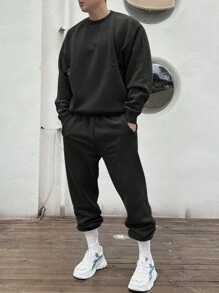 Set de 2 piezas Sudadera de cuello redondo de un solo color y pantalón de chándal casual para hombre, otoño