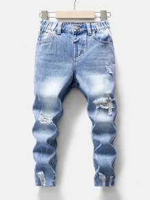 SHEIN Streecool Kids 适合所有季节的年轻男孩休闲日常经典破洞舒适牛仔裤