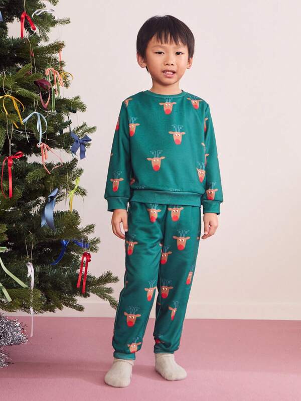 SHEIN Set de 2 piezas de pantalón y parte superior de manga larga con cuello redondo con estampado de animales de dibujos animados para niño pequeño, informal y holgado, para otoño/invierno, para Navidad