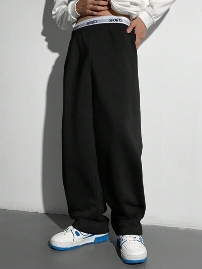 SHEIN Lässige, locker sitzende Jogginghose für Teenager-Jungs, melierter grauer Hose mit Gummibund und englischem Text, Vintage-Stil geeignet für Herbst, Frühling, Schule, Zuhause, Alltag, Sport, Geburtstagsfeiern, Ausflüge, vielseitig einfaches Design, Valentinstag