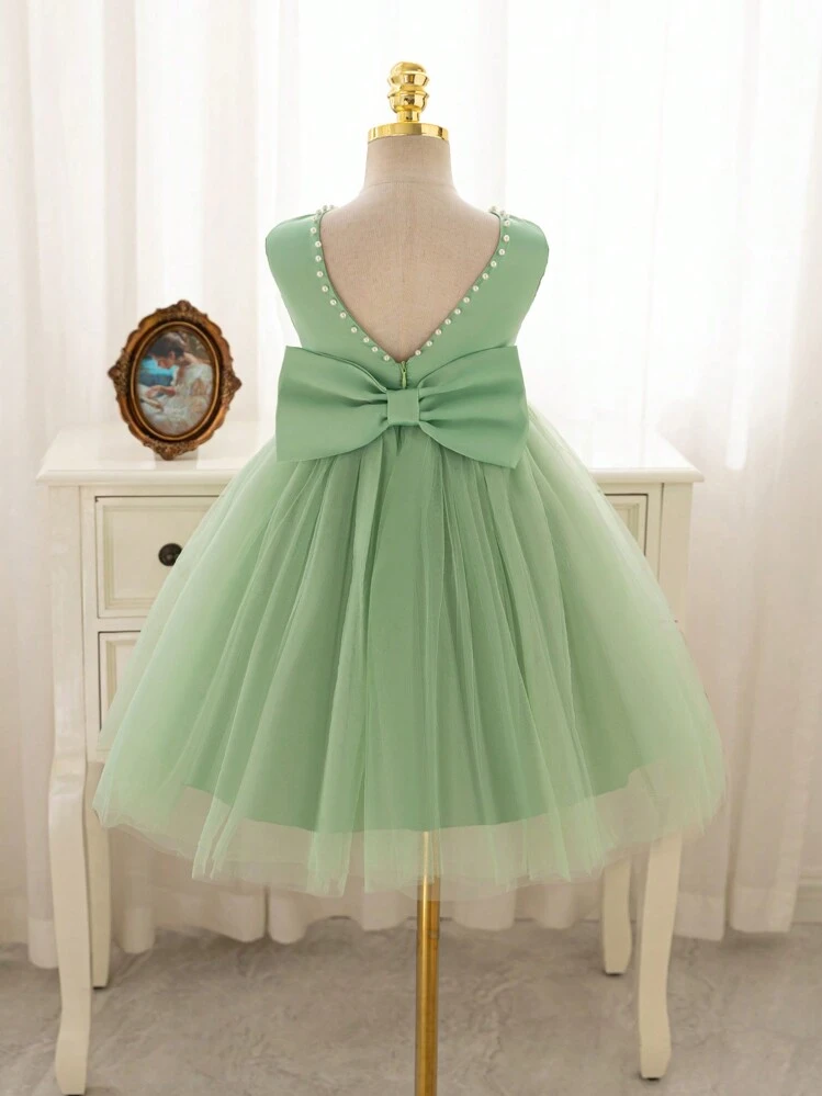 SHEIN Glamorique Kids Vestido de fiesta de Navidad para niña pequeña, vestido de año nuevo para niña de flores de boda, vestido de princesa de satén suave color verde claro, vestido de fiesta de Navidad con escote en V, lazo hueco y para banquete - Verde - Añade 1