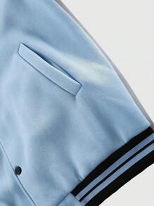Manfinity Hypemode Chaqueta universitaria de ajuste holgado para hombre, de 1 pieza, con estampado de expresión y bloques de color en los hombros