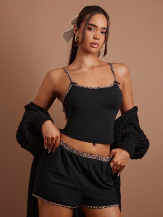COSMINA Ensemble 2 pièces femme, débardeur avec bordure imprimé léopard et short très court, noir