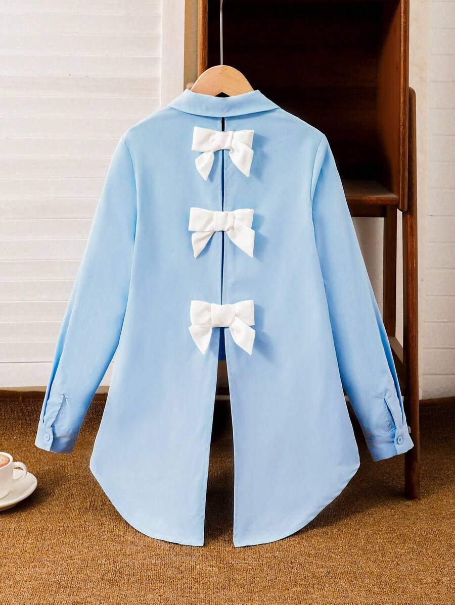 SHEIN LMoss Kids LMoss 青少年女孩鈕扣前襟梭織長袖襯衫,背面對比色蝴蝶結裝飾,圓弧下擺 - 淺藍色 - 查看 1